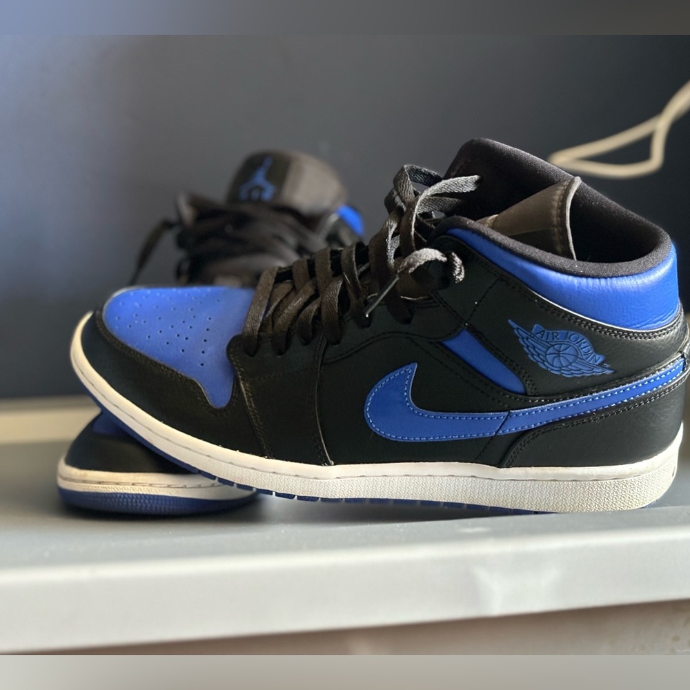 Black and blue Nikes